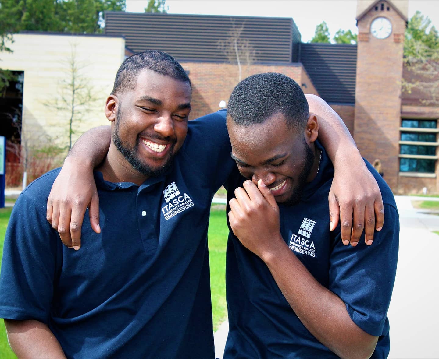 two male engineering students laughing