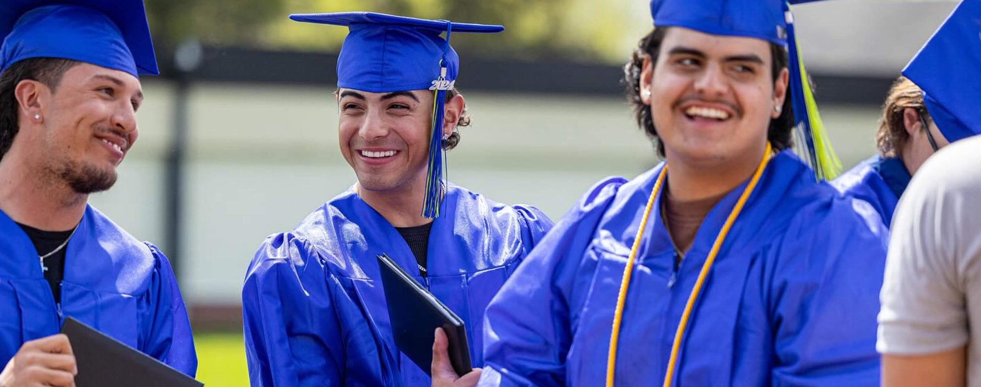 Students in their cap and gown for graduation.