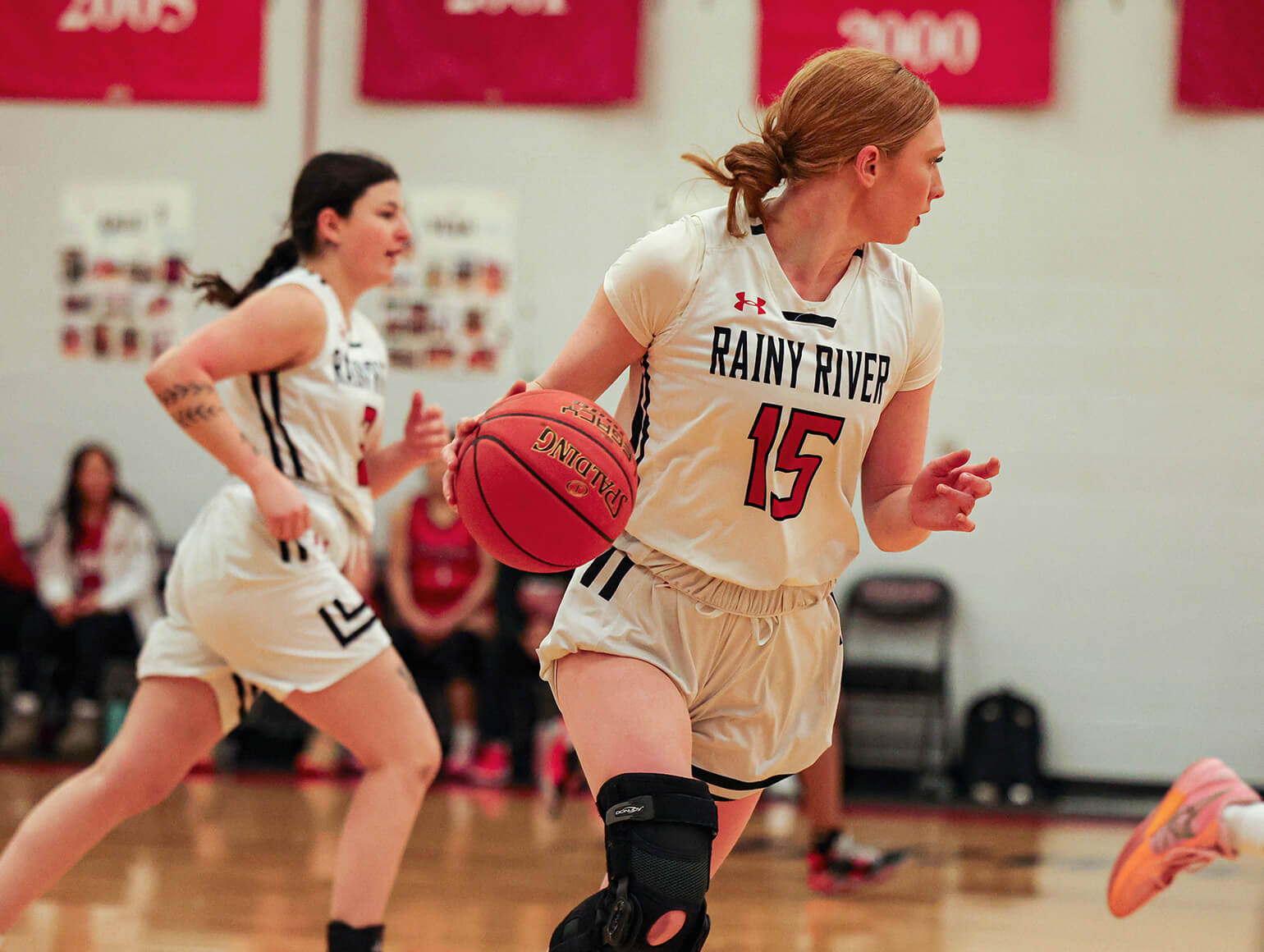 Rainy River athlete plays basketball.