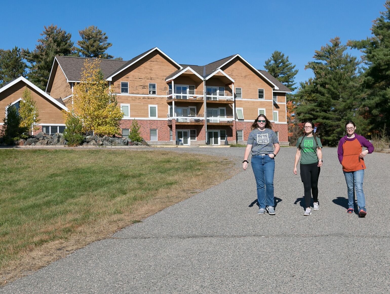 Students walking near a building on the Vermilion campus.