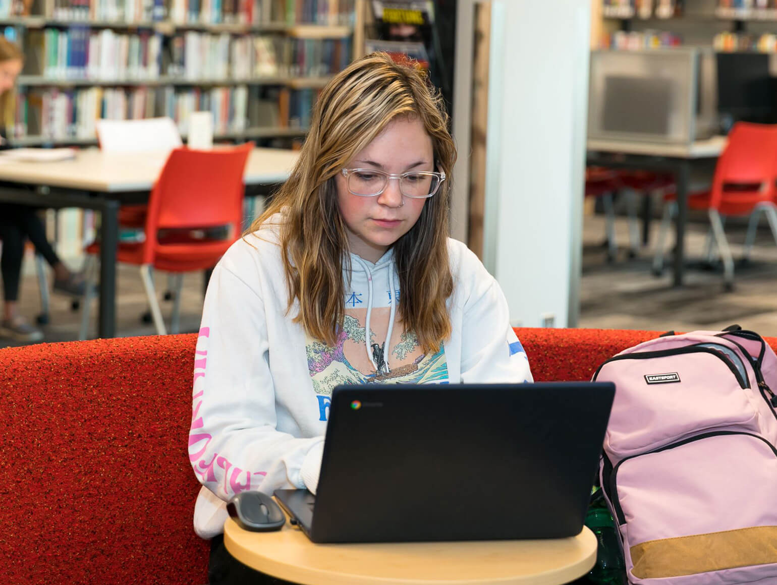 Woman working on her laptop.