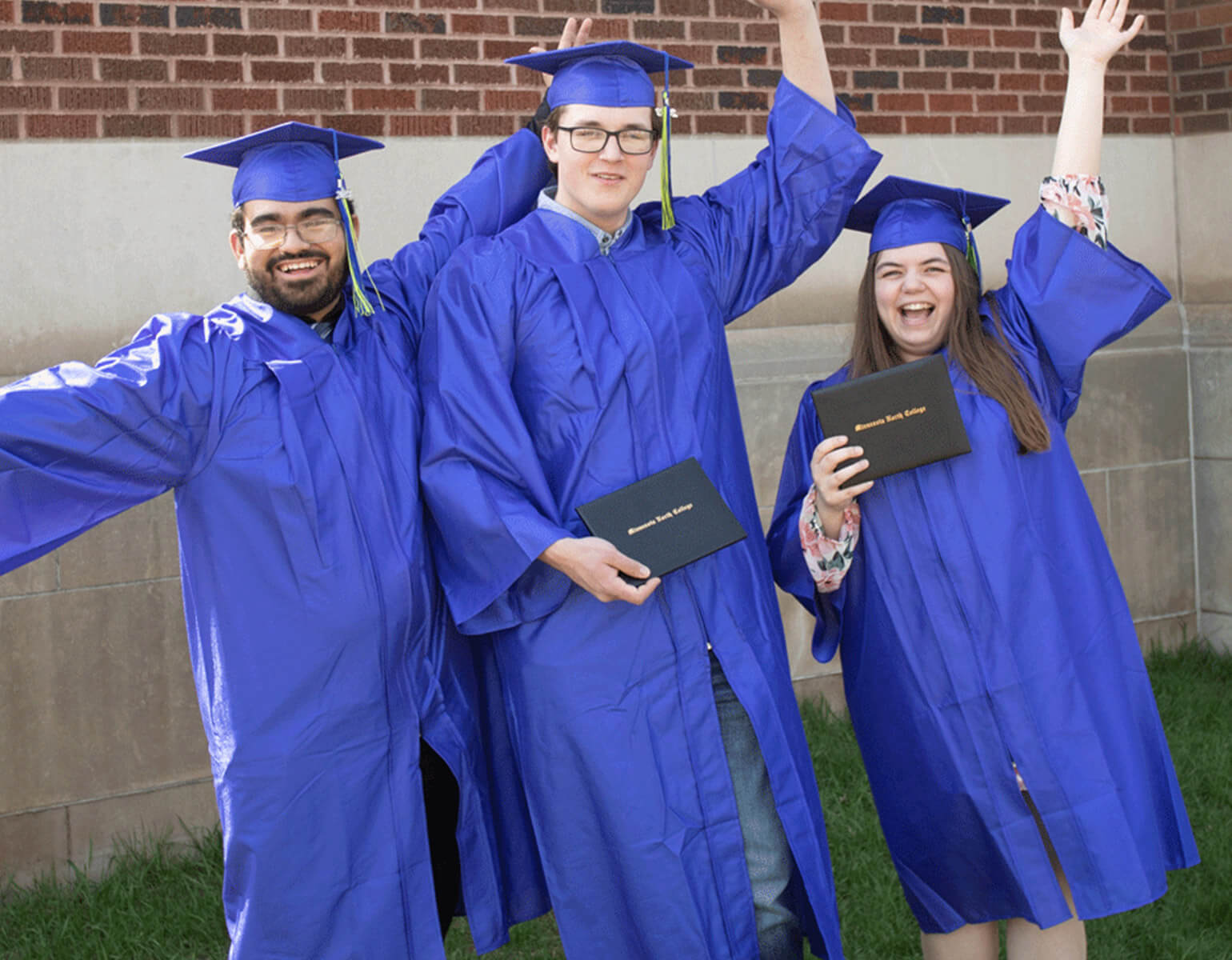 Students celebrating graduation.