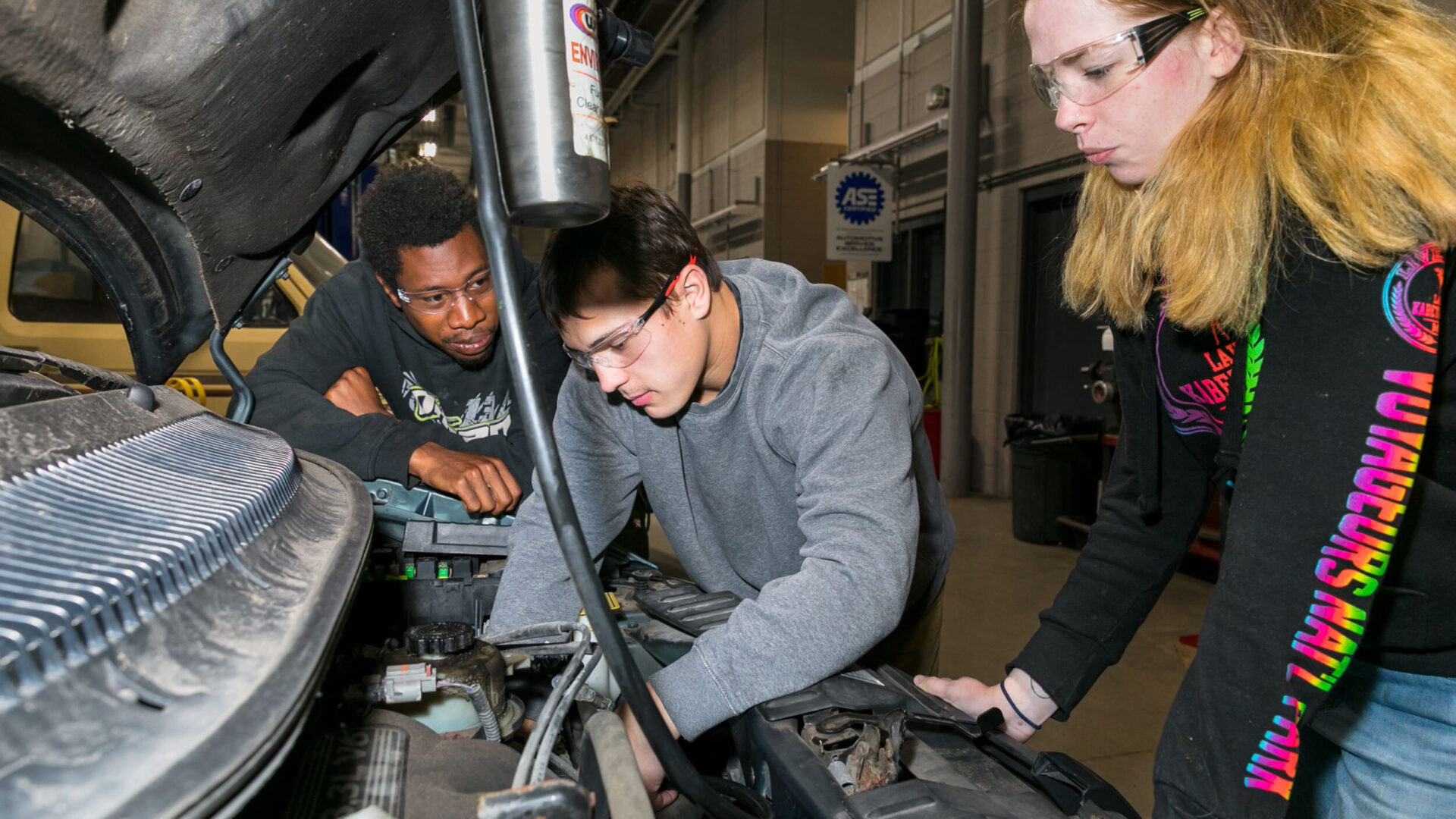 Students working on a car.