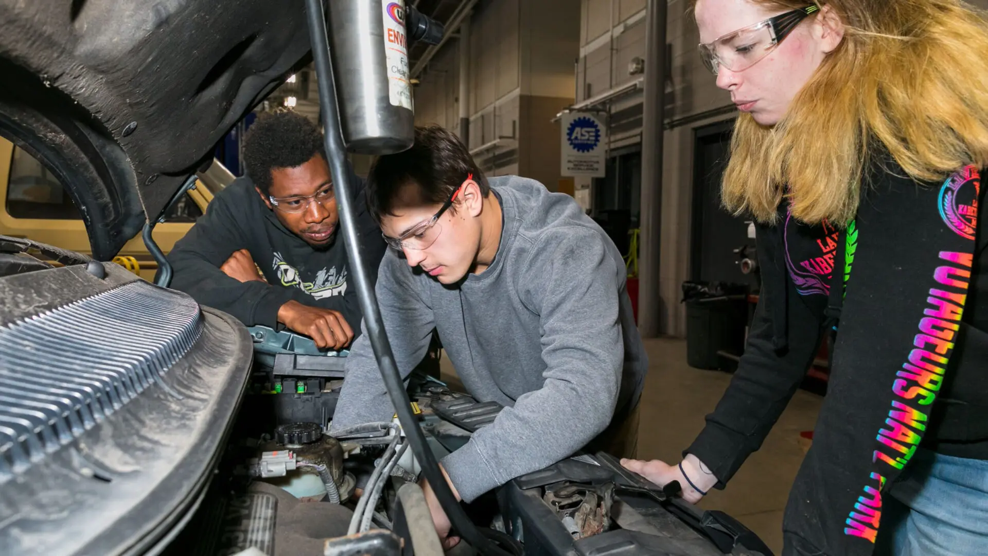 Students working on a car.