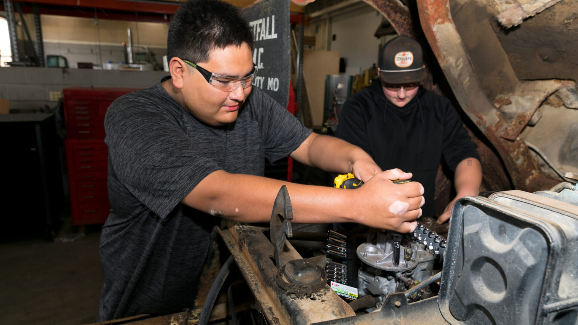 Students working on an engine.