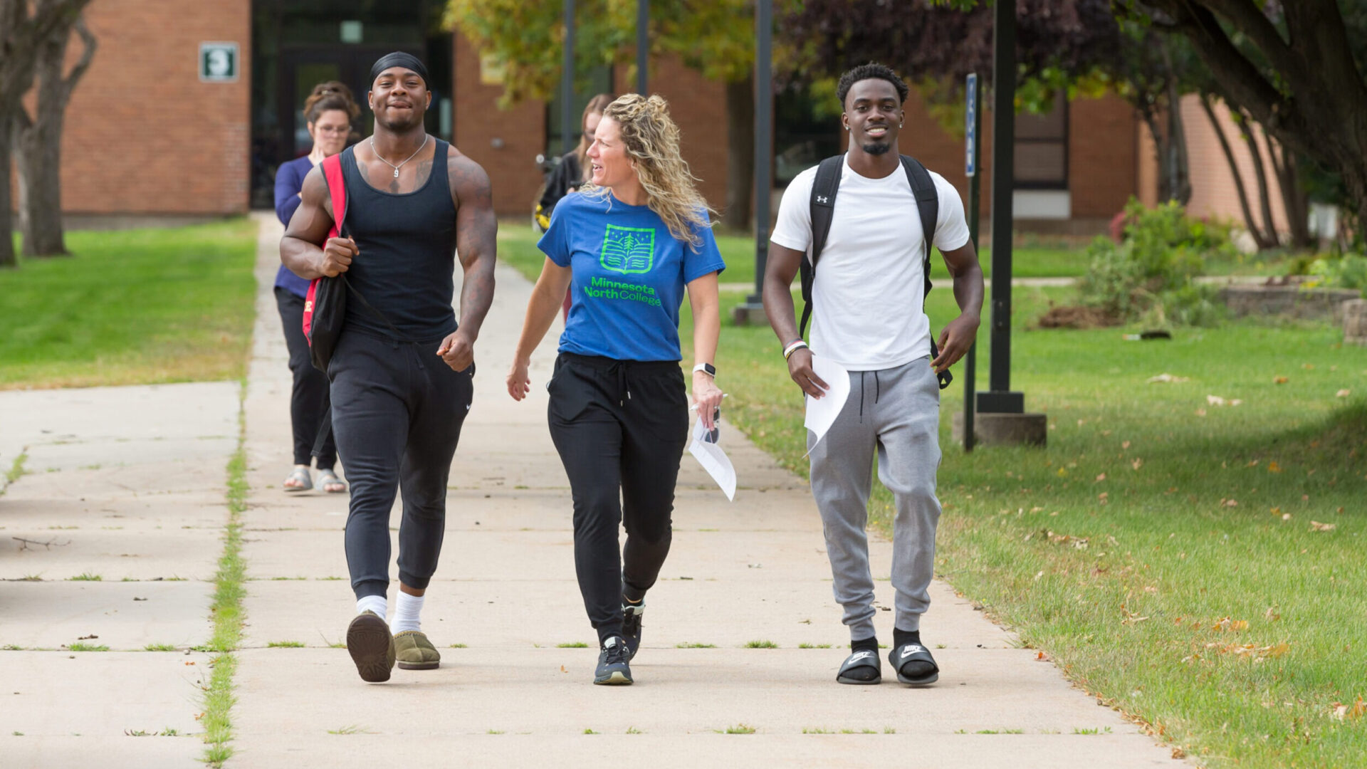 Students walking on campus.