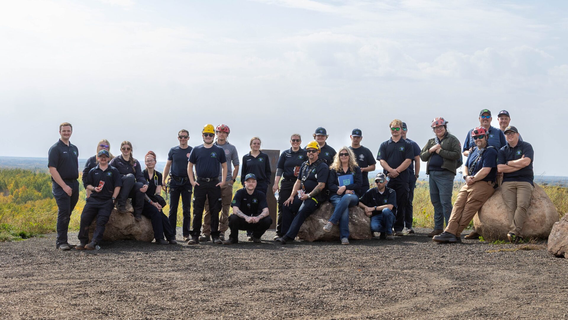 paramedic class standing on top of an overlook, all dressed in uniforms